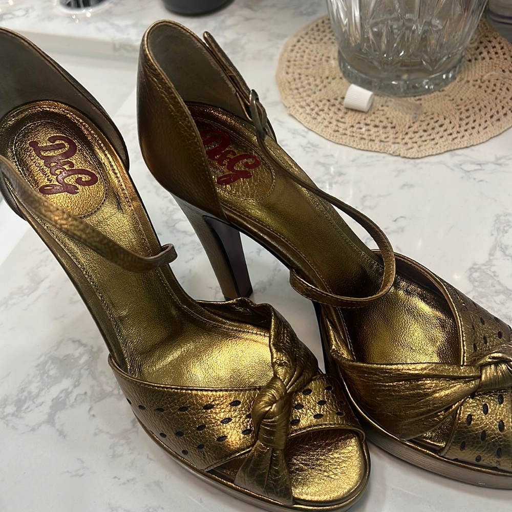 Dolce & Gabbana size 38 1/2 Gold like new but way to high for me.